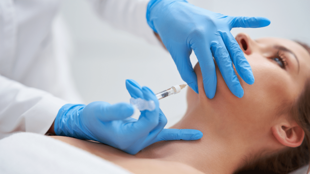 Woman getting facial treatment.