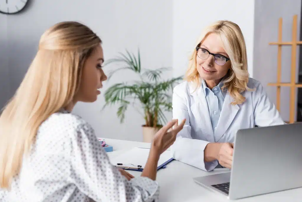 female patient on consultation for collagen biostimulators and botox treatment