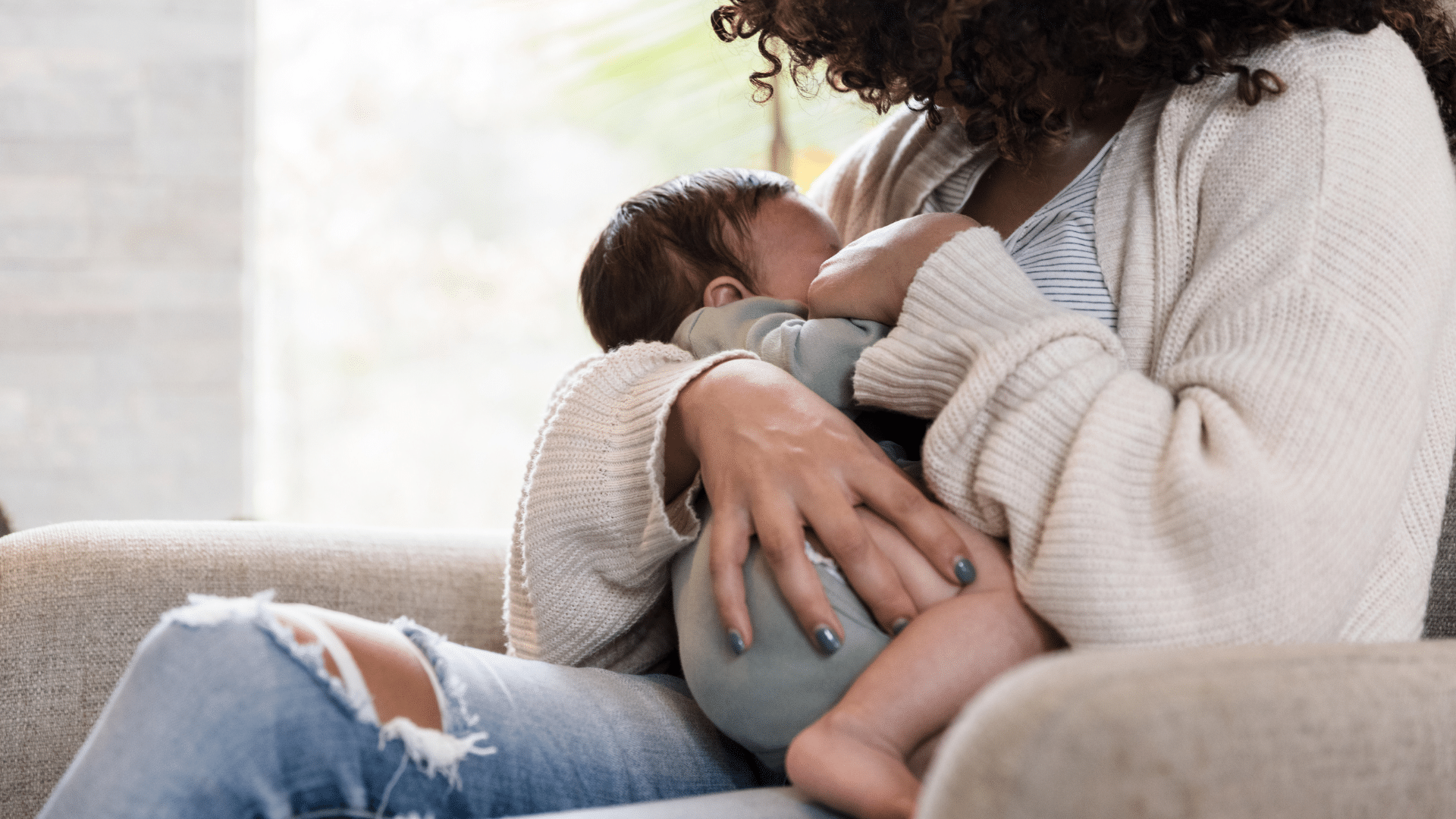 Woman breastfeeding her child.