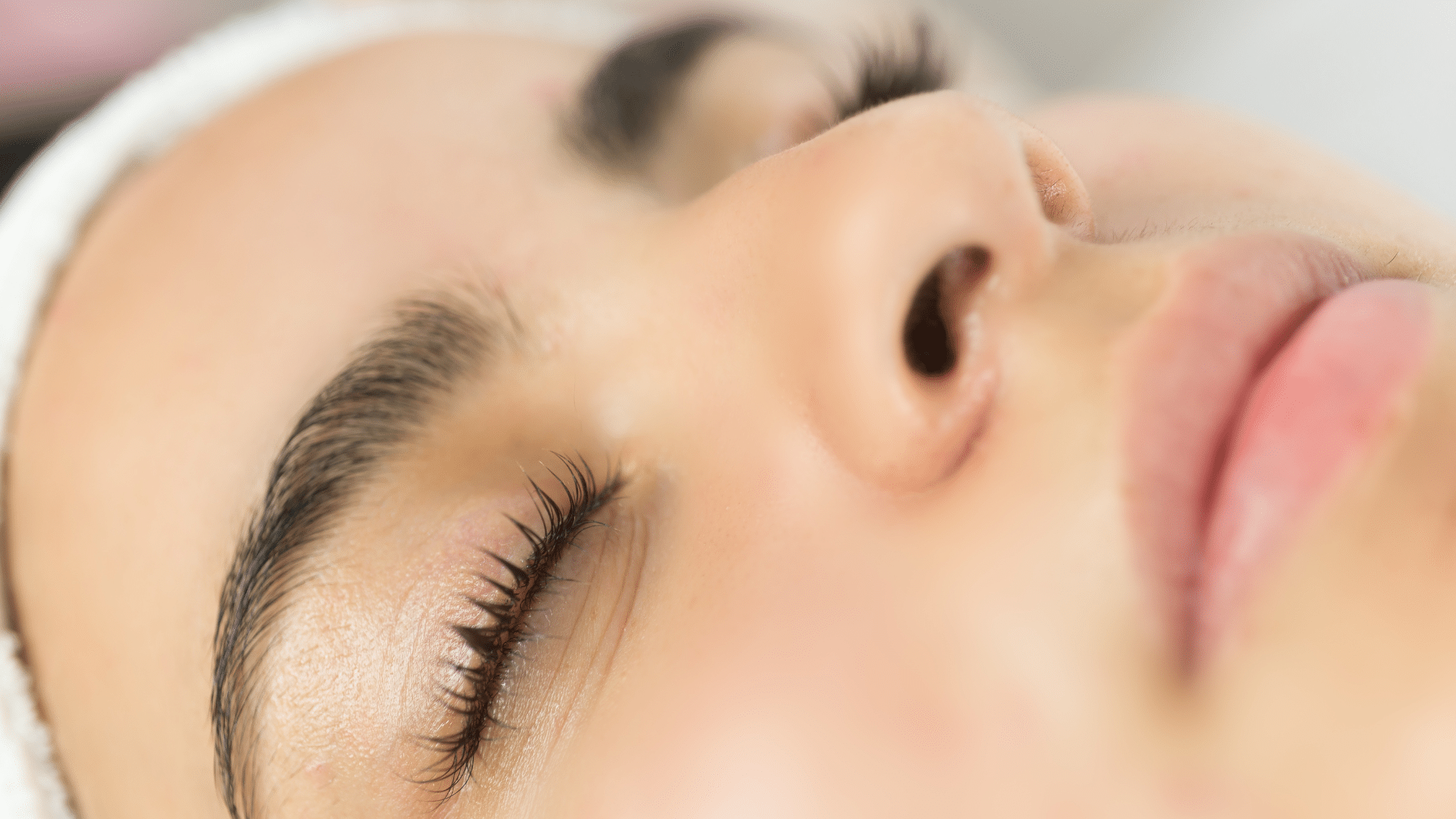 Woman getting facial treatment.