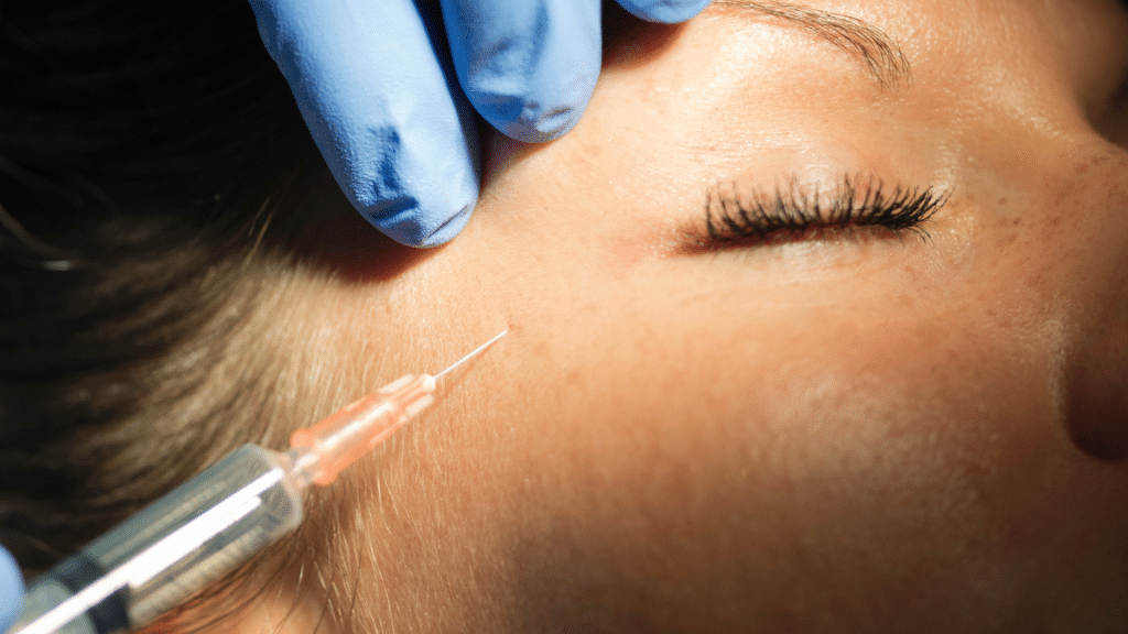 Woman getting filler injection.