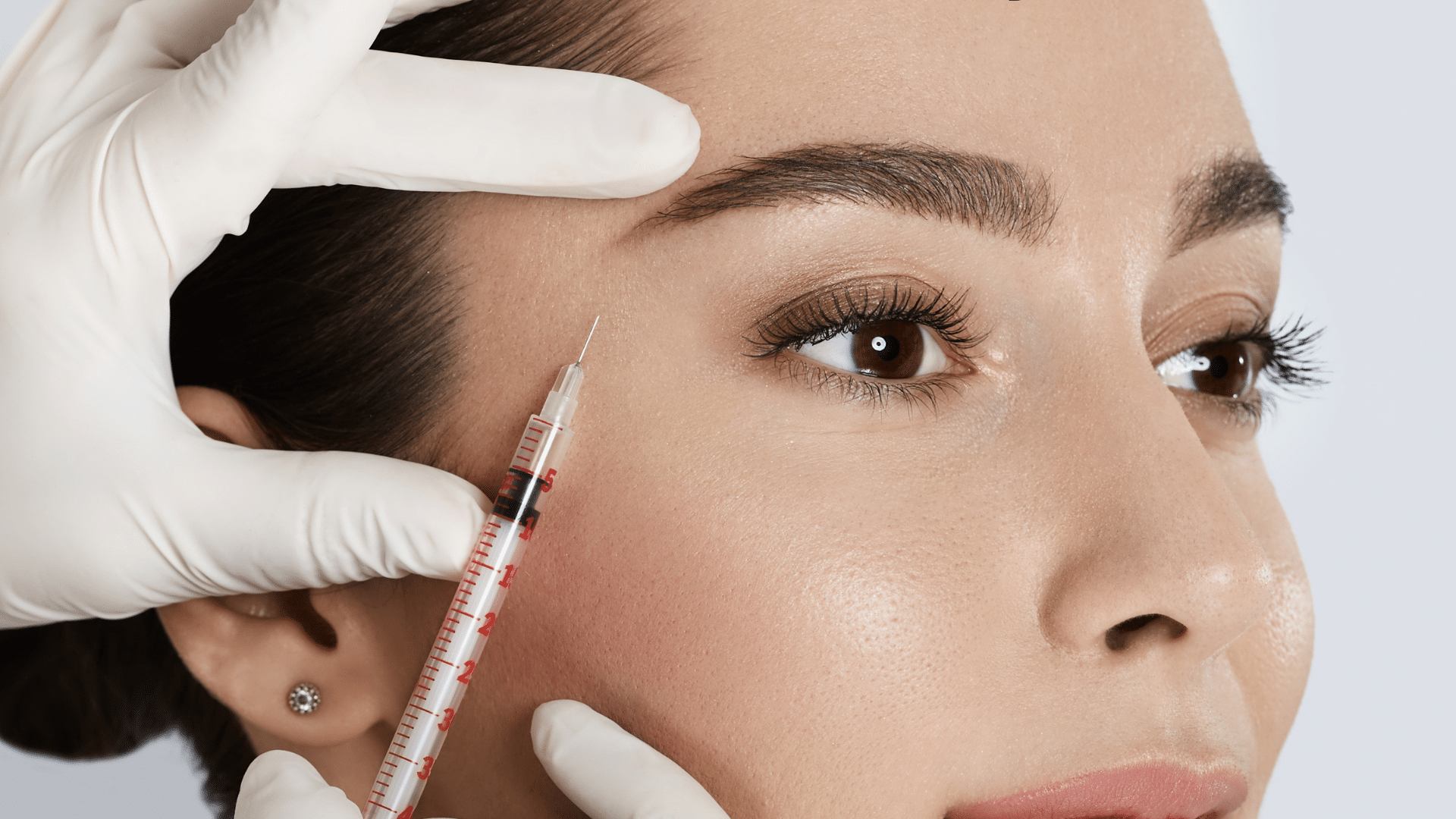 Woman getting injected.