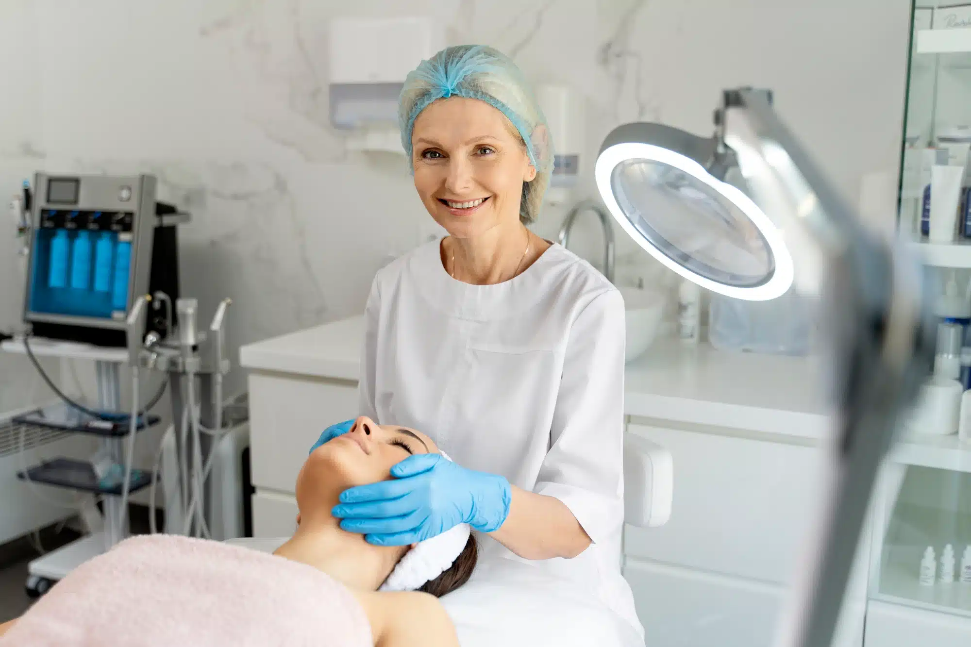 female doctor providing patient treatment in her medspa