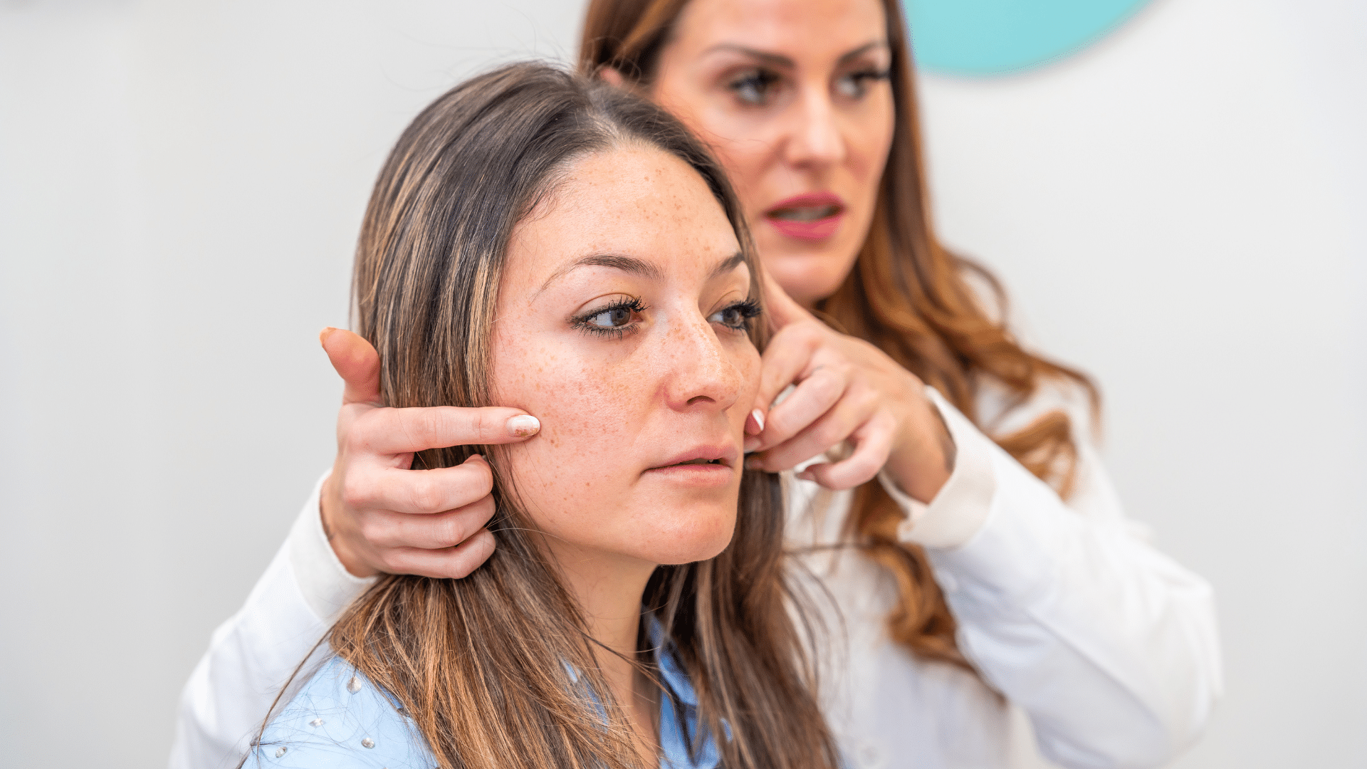 Woman getting facial treatment.