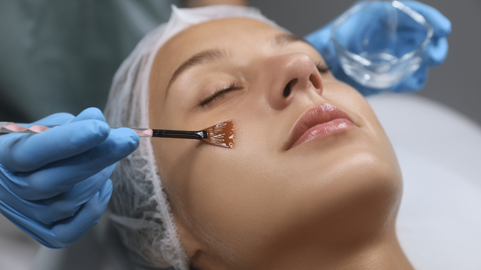 Woman getting facial treatment.